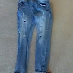 Light blue ripped jeans